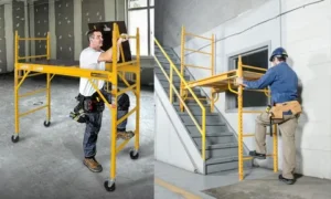 Workers using portable scaffolding indoors and on stairs